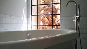 Image of a freestanding tub and faucet in a Whole House Remodel in Scottsdale