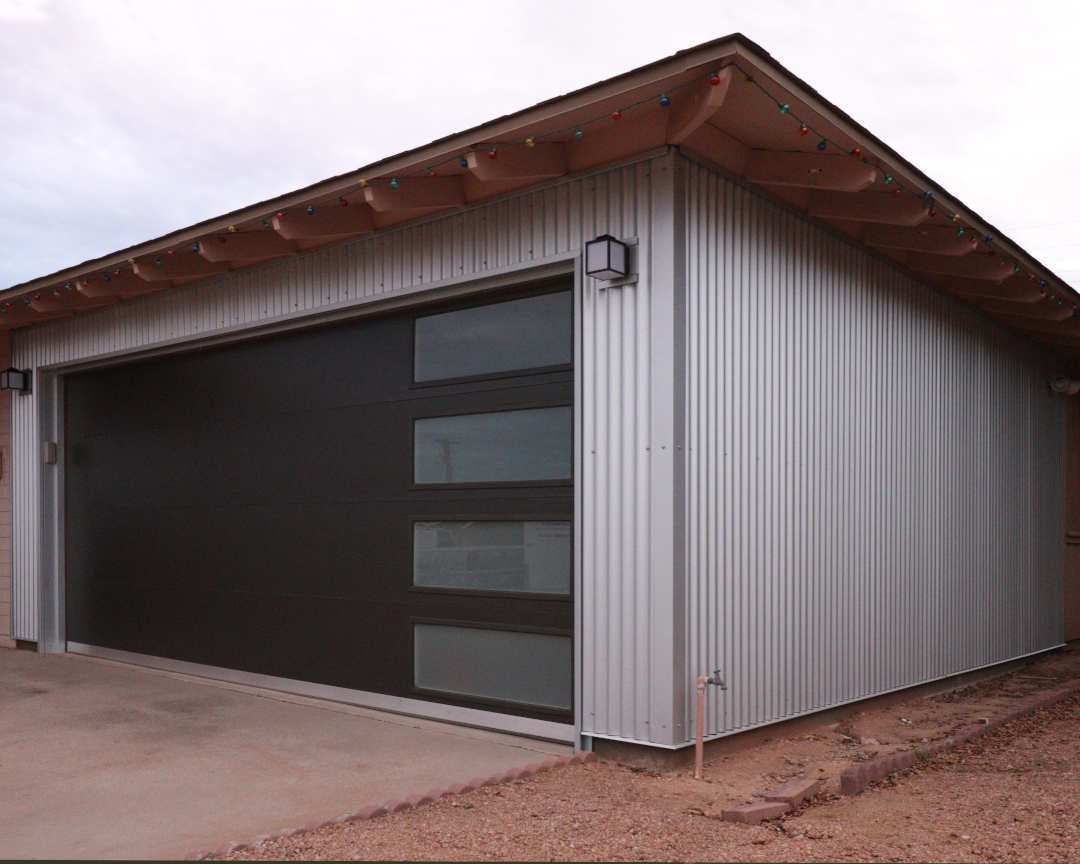 carport to garage conversion with corrugated metal siding